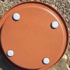 gliding feet on steel plant saucer
